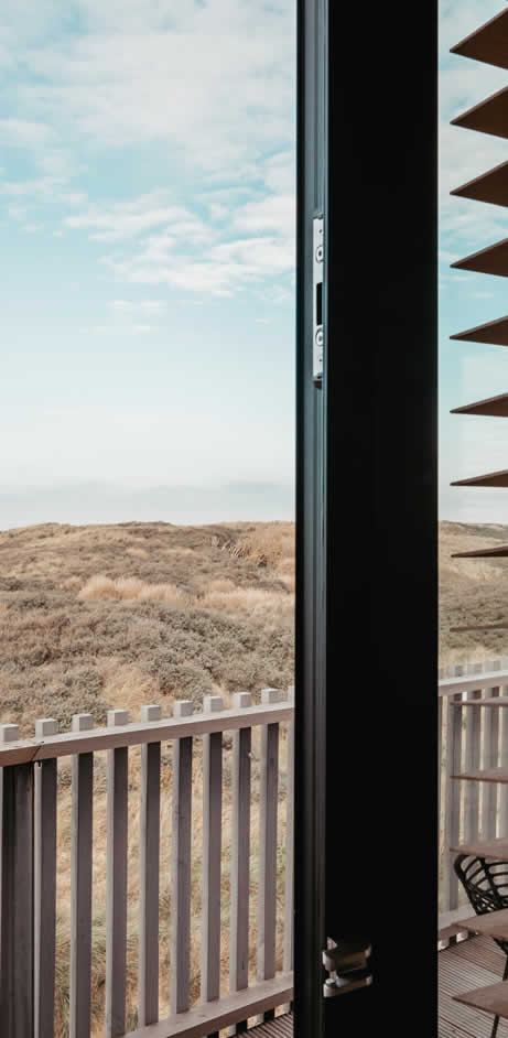 Uitzicht over de duinen strand hotel zoomers in castricum aan zee